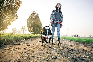 a lady walking her dog as she usually does for around 45 minutes per day