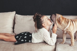 a girl saying bye to her pet while being watched by Fair Lakes VA Dog Sitting