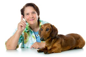 Woman giving tips to get your dog to come inside when called