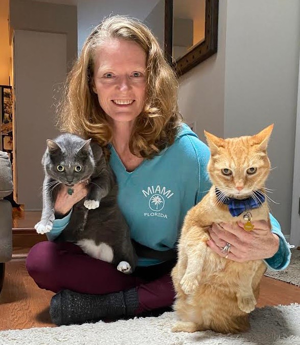 Deb Furey with two cats